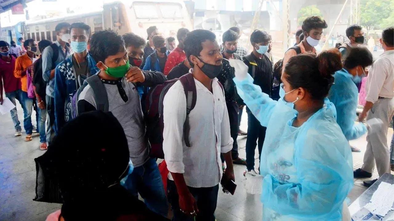 A health worker collects a swab sample for Covid-19 test. File Pic